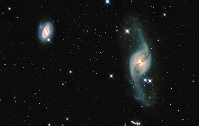 La galassia dai mille volti: NGC 3718